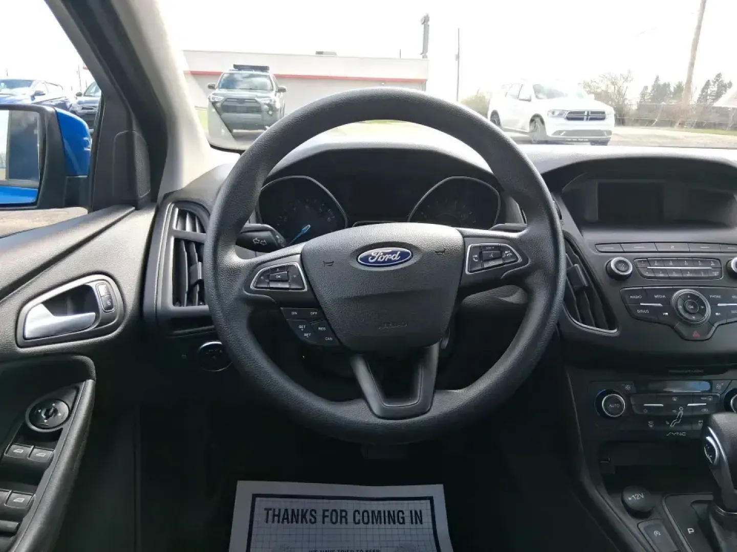 2018 Ford Focus SE (1FADP3FE4JL) with an 1.0L L3 engine, Automatic transmission, located at 1951 S Dayton Lakeview Rd., New Carlisle, OH, 45344, (937) 908-9800, 39.890999, -84.050255 - Need a dependable commuter that's easy to park downtown, comfortable on I70, and efficient enough for everyday errands from Meijer runs to school drop-offs? This 2018 Ford Focus SE sedan is a smart, budget-friendly choice for life in and around New Carlisle, offering modern tech, confidence-inspirin - Photo#16