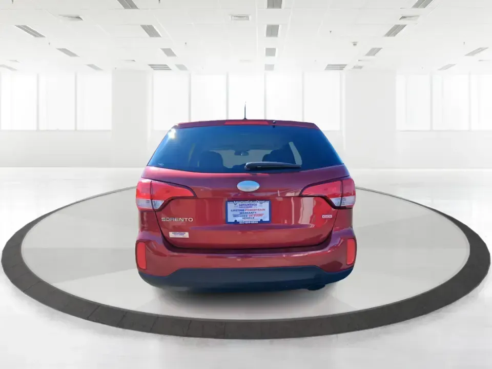 2015 Kia Sorento LX (5XYKTCA67FG) with an 2.4L I-4 gasoline direct injection engine, 6-Speed Automatic transmission, located at 1951 S Dayton Lakeview Rd., New Carlisle, OH, 45344, (937) 908-9800, 39.890999, -84.050255 - Weekend road trips to John Bryan State Park, busy school mornings, or a long commute down I70-this 2015 Kia Sorento LX is the kind of SUV that fits real life in the Miami Valley. Finished in eye-catching Remington Red Metallic, it's a practical, confidence-inspiring choice for growing families, outd - Photo#3