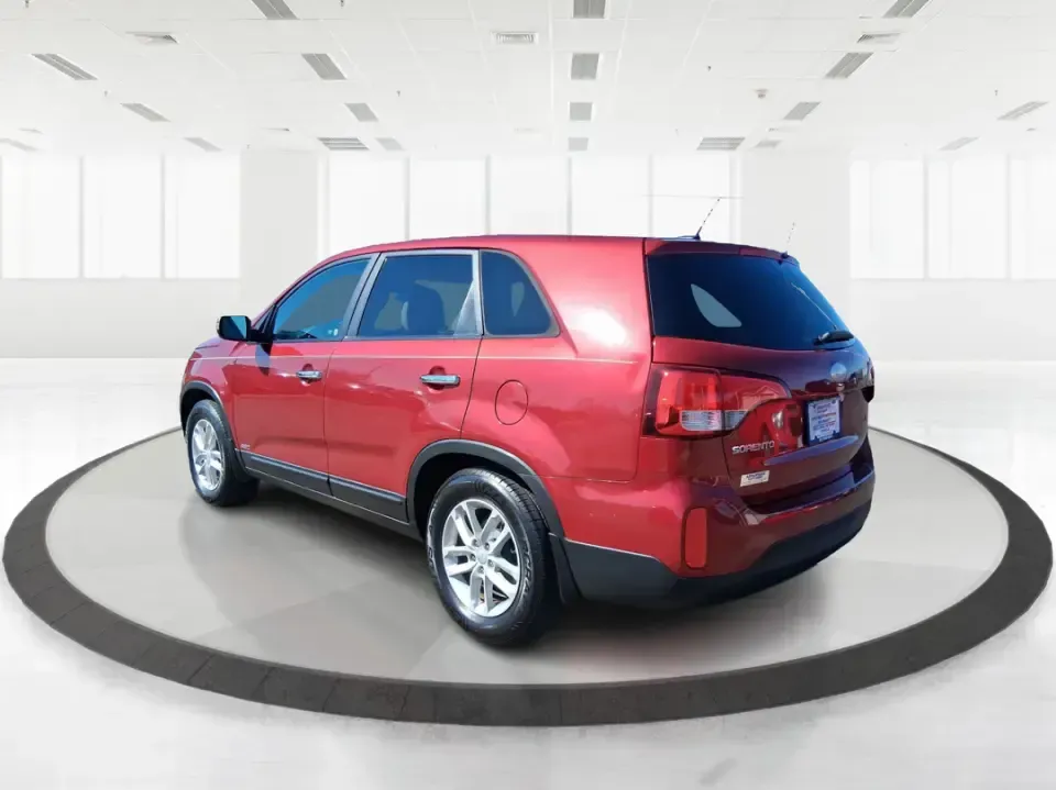 2015 Kia Sorento LX (5XYKTCA67FG) with an 2.4L I-4 gasoline direct injection engine, 6-Speed Automatic transmission, located at 1951 S Dayton Lakeview Rd., New Carlisle, OH, 45344, (937) 908-9800, 39.890999, -84.050255 - Weekend road trips to John Bryan State Park, busy school mornings, or a long commute down I70-this 2015 Kia Sorento LX is the kind of SUV that fits real life in the Miami Valley. Finished in eye-catching Remington Red Metallic, it's a practical, confidence-inspiring choice for growing families, outd - Photo#4