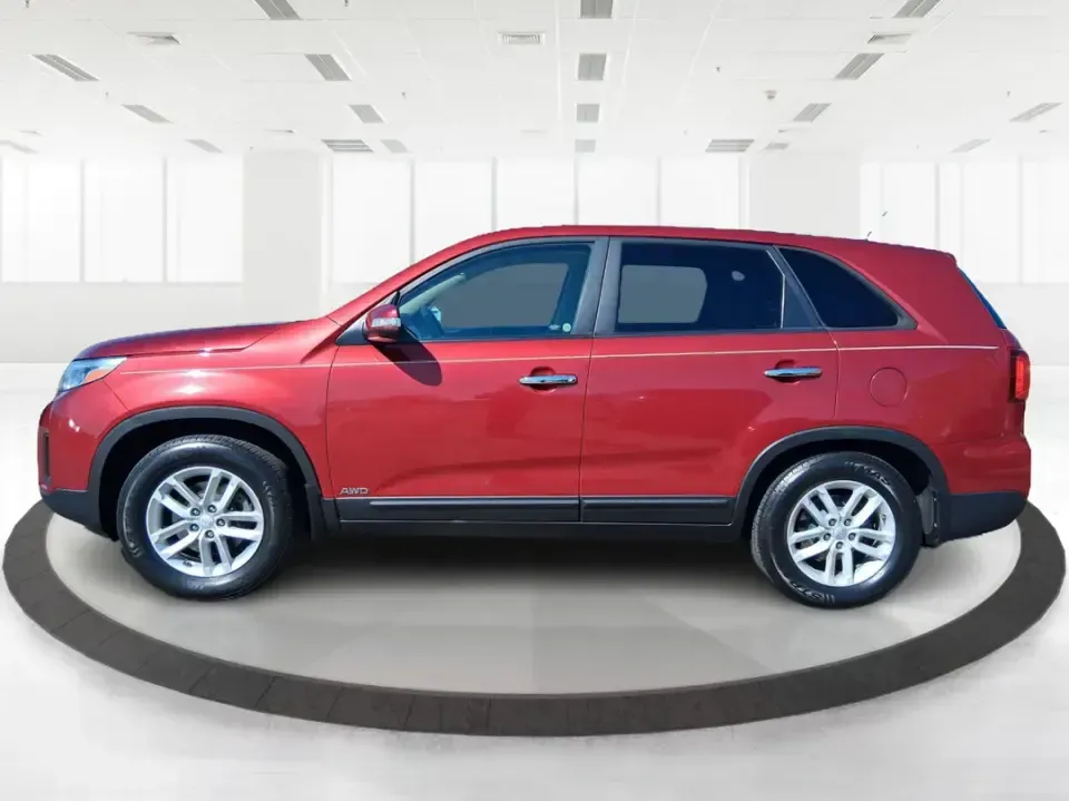 2015 Kia Sorento LX (5XYKTCA67FG) with an 2.4L I-4 gasoline direct injection engine, 6-Speed Automatic transmission, located at 1951 S Dayton Lakeview Rd., New Carlisle, OH, 45344, (937) 908-9800, 39.890999, -84.050255 - Weekend road trips to John Bryan State Park, busy school mornings, or a long commute down I70-this 2015 Kia Sorento LX is the kind of SUV that fits real life in the Miami Valley. Finished in eye-catching Remington Red Metallic, it's a practical, confidence-inspiring choice for growing families, outd - Photo#5