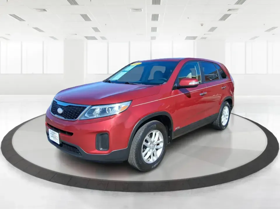 2015 Kia Sorento LX (5XYKTCA67FG) with an 2.4L I-4 gasoline direct injection engine, 6-Speed Automatic transmission, located at 1951 S Dayton Lakeview Rd., New Carlisle, OH, 45344, (937) 908-9800, 39.890999, -84.050255 - Weekend road trips to John Bryan State Park, busy school mornings, or a long commute down I70-this 2015 Kia Sorento LX is the kind of SUV that fits real life in the Miami Valley. Finished in eye-catching Remington Red Metallic, it's a practical, confidence-inspiring choice for growing families, outd - Photo#8