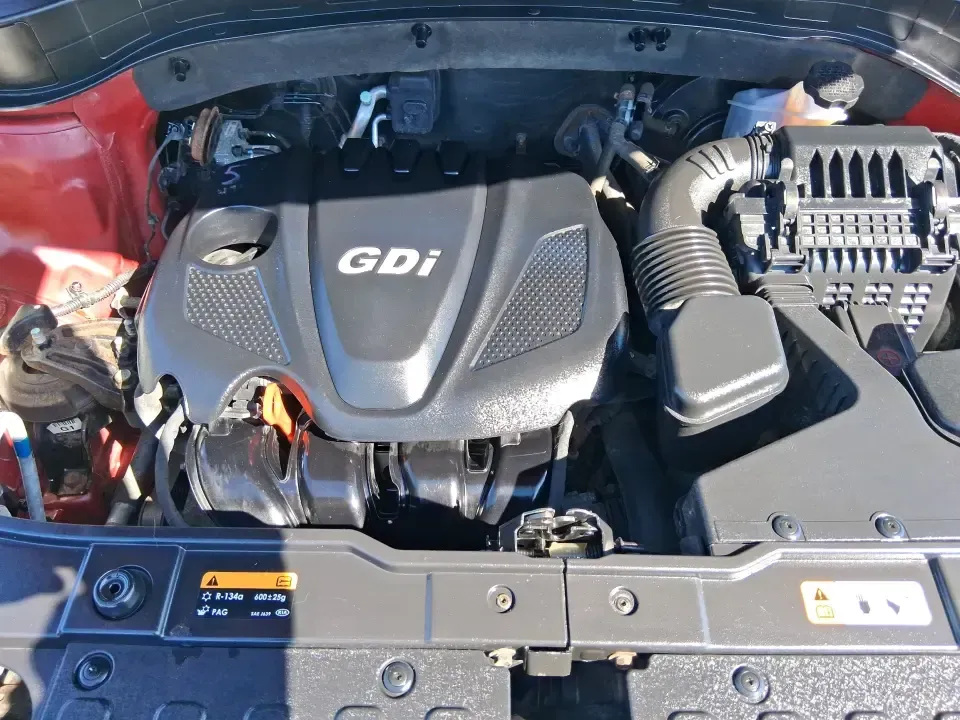 2015 Kia Sorento LX (5XYKTCA67FG) with an 2.4L I-4 gasoline direct injection engine, 6-Speed Automatic transmission, located at 1951 S Dayton Lakeview Rd., New Carlisle, OH, 45344, (937) 908-9800, 39.890999, -84.050255 - Weekend road trips to John Bryan State Park, busy school mornings, or a long commute down I70-this 2015 Kia Sorento LX is the kind of SUV that fits real life in the Miami Valley. Finished in eye-catching Remington Red Metallic, it's a practical, confidence-inspiring choice for growing families, outd - Photo#11