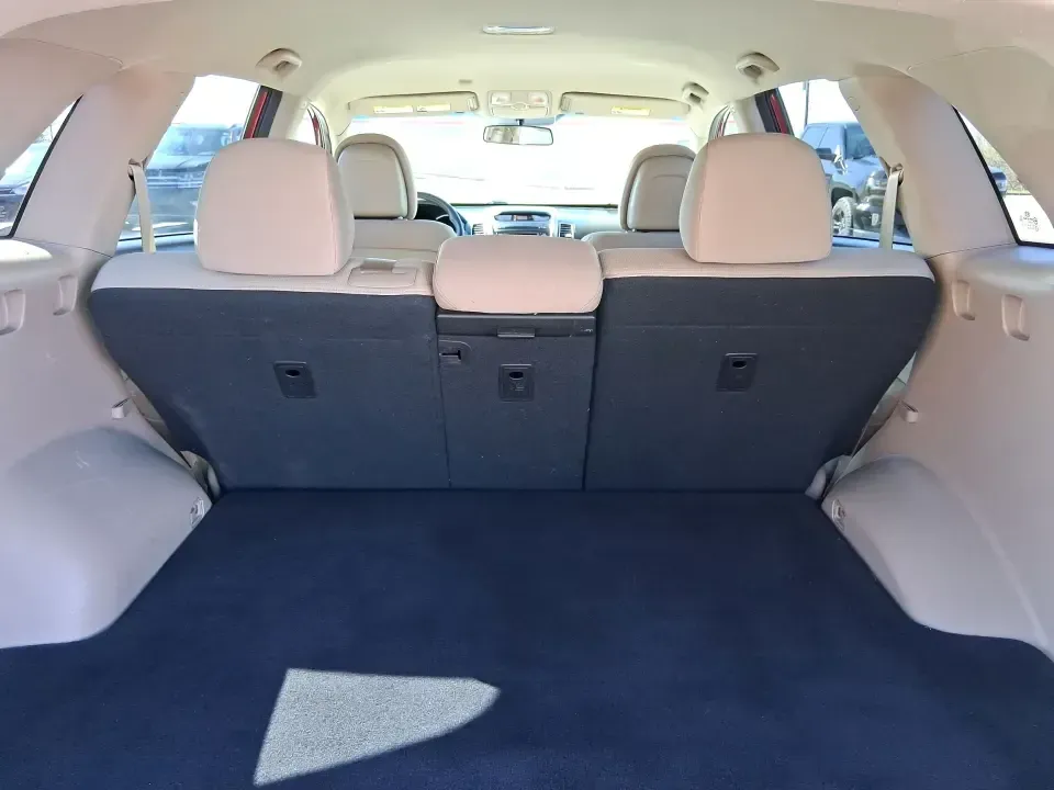 2015 Kia Sorento LX (5XYKTCA67FG) with an 2.4L I-4 gasoline direct injection engine, 6-Speed Automatic transmission, located at 1951 S Dayton Lakeview Rd., New Carlisle, OH, 45344, (937) 908-9800, 39.890999, -84.050255 - Weekend road trips to John Bryan State Park, busy school mornings, or a long commute down I70-this 2015 Kia Sorento LX is the kind of SUV that fits real life in the Miami Valley. Finished in eye-catching Remington Red Metallic, it's a practical, confidence-inspiring choice for growing families, outd - Photo#12