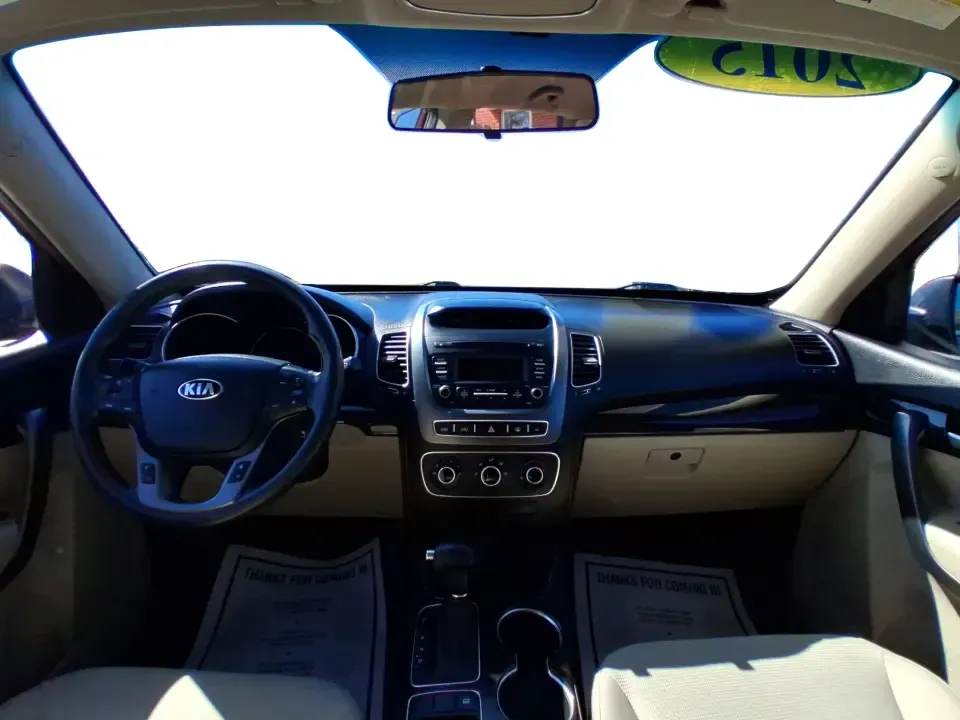 2015 Kia Sorento LX (5XYKTCA67FG) with an 2.4L I-4 gasoline direct injection engine, 6-Speed Automatic transmission, located at 1951 S Dayton Lakeview Rd., New Carlisle, OH, 45344, (937) 908-9800, 39.890999, -84.050255 - Weekend road trips to John Bryan State Park, busy school mornings, or a long commute down I70-this 2015 Kia Sorento LX is the kind of SUV that fits real life in the Miami Valley. Finished in eye-catching Remington Red Metallic, it's a practical, confidence-inspiring choice for growing families, outd - Photo#19