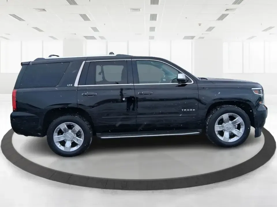 2015 Chevrolet Tahoe LTZ (1GNSKCKC9FR) with an EcoTec3 5.3L V-8 gasoline direct injection engine, 6-Speed Automatic transmission, located at 8750 N County Rd 25A, Piqua, OH, 45356, (937) 908-9800, 40.164391, -84.232513 - Big family weekend at Indian Lake, a road-trip up I-75, or a daily commute with room for coworkers and gear-this 2015 Chevrolet Tahoe LTZ 4WD is built for the kind of life that doesn't fit in a small SUV. Finished in sleek Black and powered by the EcoTec3 5.3L V8 with a smooth 6-speed automatic tran - Photo#1