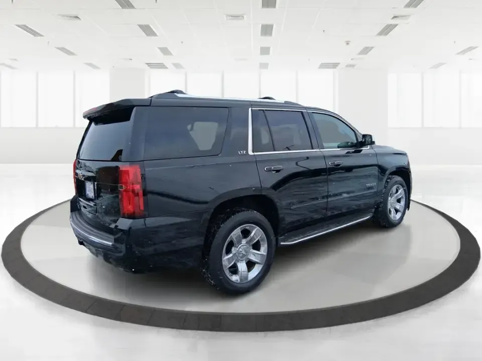 2015 Chevrolet Tahoe LTZ (1GNSKCKC9FR) with an EcoTec3 5.3L V-8 gasoline direct injection engine, 6-Speed Automatic transmission, located at 8750 N County Rd 25A, Piqua, OH, 45356, (937) 908-9800, 40.164391, -84.232513 - Big family weekend at Indian Lake, a road-trip up I-75, or a daily commute with room for coworkers and gear-this 2015 Chevrolet Tahoe LTZ 4WD is built for the kind of life that doesn't fit in a small SUV. Finished in sleek Black and powered by the EcoTec3 5.3L V8 with a smooth 6-speed automatic tran - Photo#2