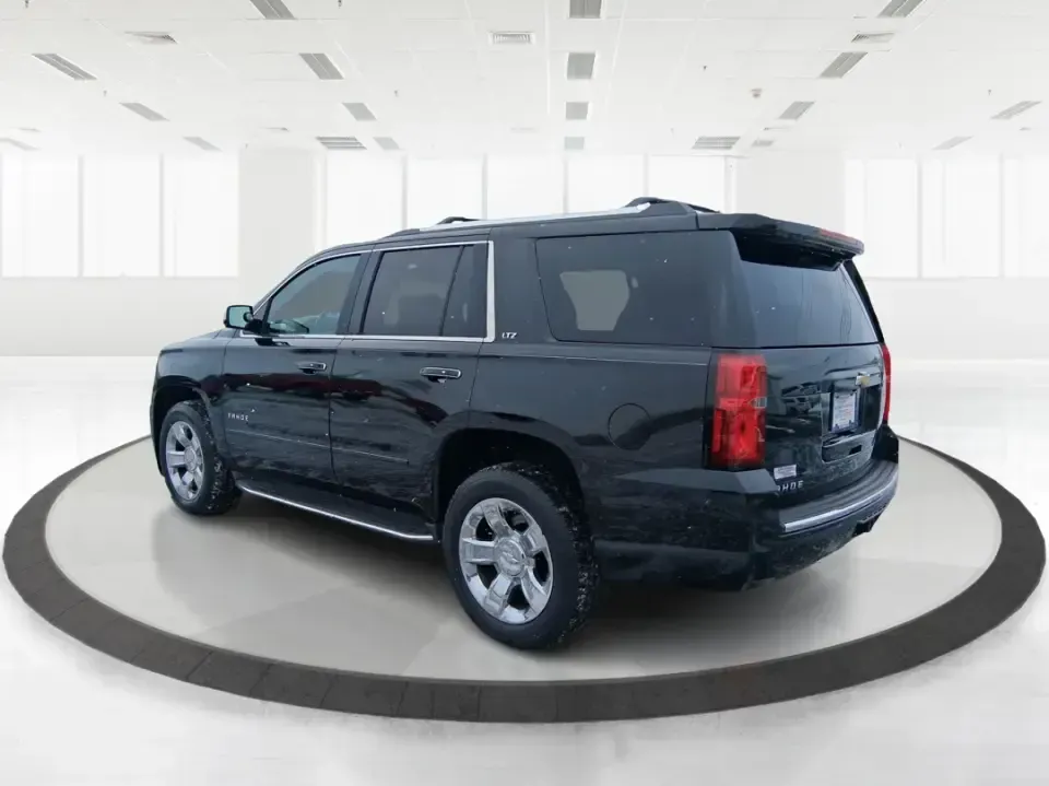 2015 Chevrolet Tahoe LTZ (1GNSKCKC9FR) with an EcoTec3 5.3L V-8 gasoline direct injection engine, 6-Speed Automatic transmission, located at 8750 N County Rd 25A, Piqua, OH, 45356, (937) 908-9800, 40.164391, -84.232513 - Big family weekend at Indian Lake, a road-trip up I-75, or a daily commute with room for coworkers and gear-this 2015 Chevrolet Tahoe LTZ 4WD is built for the kind of life that doesn't fit in a small SUV. Finished in sleek Black and powered by the EcoTec3 5.3L V8 with a smooth 6-speed automatic tran - Photo#4