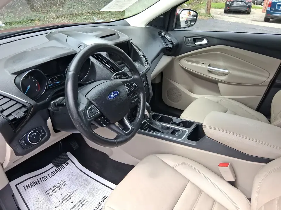 2018 Ford Escape SEL (1FMCU9HD2JU) with an 1.5L L4 DOHC 16V engine, 6A transmission, located at 401 Woodman Dr, Riverside, OH, 45431, (937) 908-9800, 39.760899, -84.123421 - Need a do-it-all SUV that can handle the weekday commute on I-675, quick school drop-offs near Wright-Patterson AFB, and spontaneous weekend getaways to Carillon Historical Park or a lap around Eastwood MetroPark? This 2018 Ford Escape SEL in Ruby Red Metallic Tinted Clearcoat is built for real-life - Photo#9