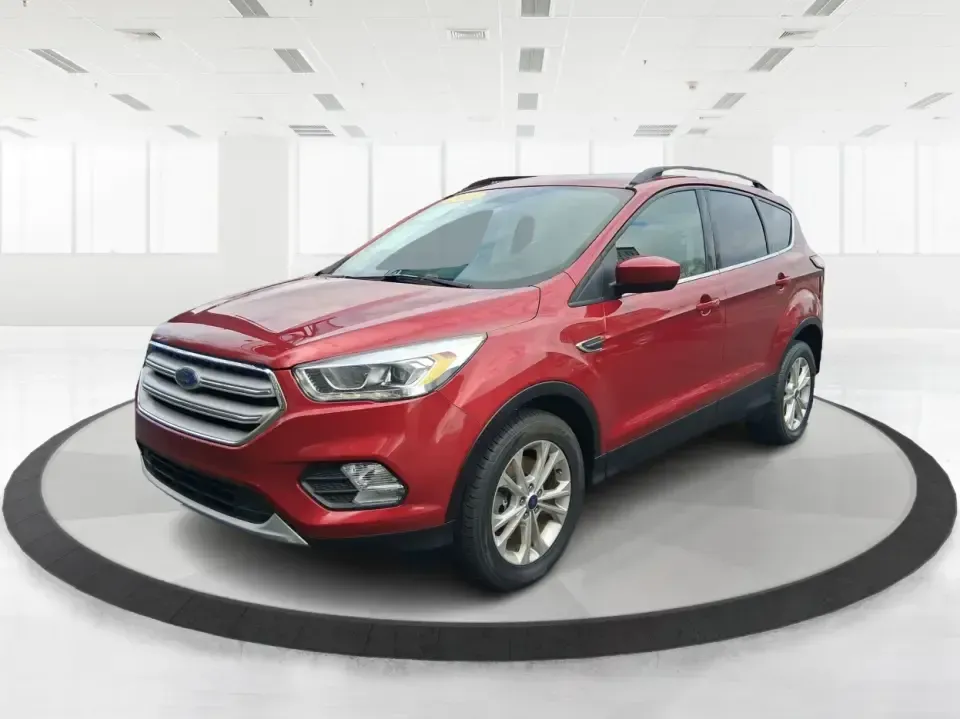2018 Ford Escape SEL (1FMCU9HD2JU) with an 1.5L L4 DOHC 16V engine, 6A transmission, located at 4508 South Dixie Dr, Moraine, OH, 45439, (937) 908-9800, 39.689976, -84.218452 - Need a do-it-all SUV that can handle the weekday commute on I-675, quick school drop-offs near Wright-Patterson AFB, and spontaneous weekend getaways to Carillon Historical Park or a lap around Eastwood MetroPark? This 2018 Ford Escape SEL in Ruby Red Metallic Tinted Clearcoat is built for real-life - Photo#8