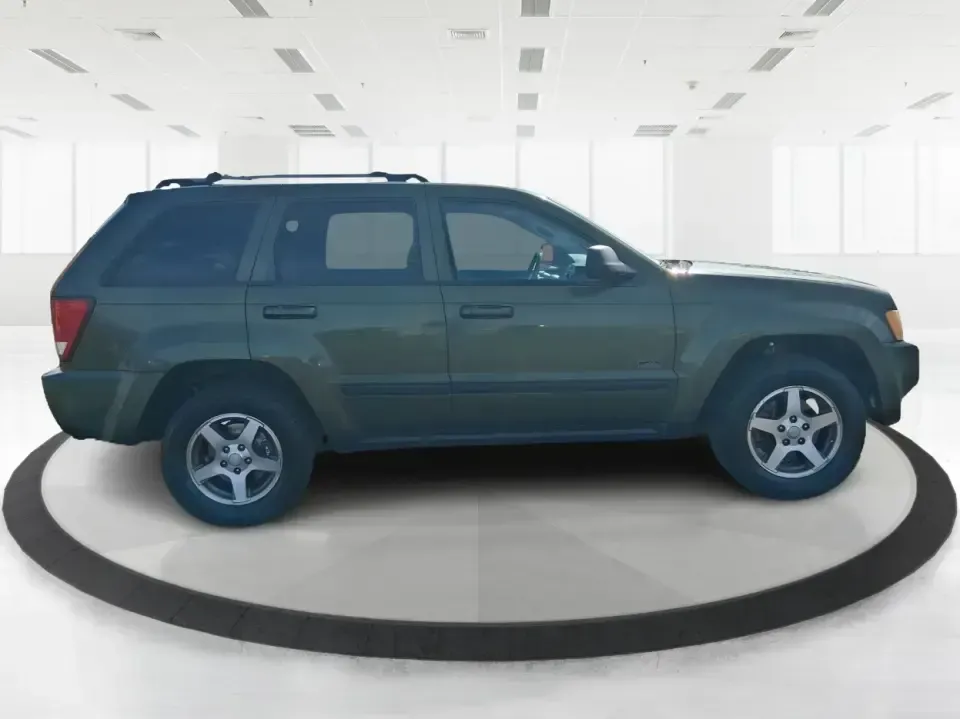 2007 Jeep Grand Cherokee Laredo (1J8GR48K47C) with an 3.7L V6 SOHC 12V engine, 5-Speed Automatic Overdrive transmission, located at 880 E. National Road, Vandalia, OH, 45377, (937) 908-9800, 39.891918, -84.183594 - Weekend getaways to the trails, winter commutes on slick Ohio roads, and family errands across town all get easier when you're in a capable SUV with true 4WD confidence. This **2007 Jeep Grand Cherokee Laredo** is built for drivers who want classic Jeep utility without giving up everyday comfort-ide - Photo#1