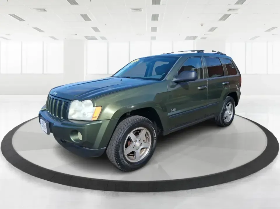2007 Jeep Grand Cherokee Laredo (1J8GR48K47C) with an 3.7L V6 SOHC 12V engine, 5-Speed Automatic Overdrive transmission, located at 880 E. National Road, Vandalia, OH, 45377, (937) 908-9800, 39.891918, -84.183594 - Weekend getaways to the trails, winter commutes on slick Ohio roads, and family errands across town all get easier when you're in a capable SUV with true 4WD confidence. This **2007 Jeep Grand Cherokee Laredo** is built for drivers who want classic Jeep utility without giving up everyday comfort-ide - Photo#8