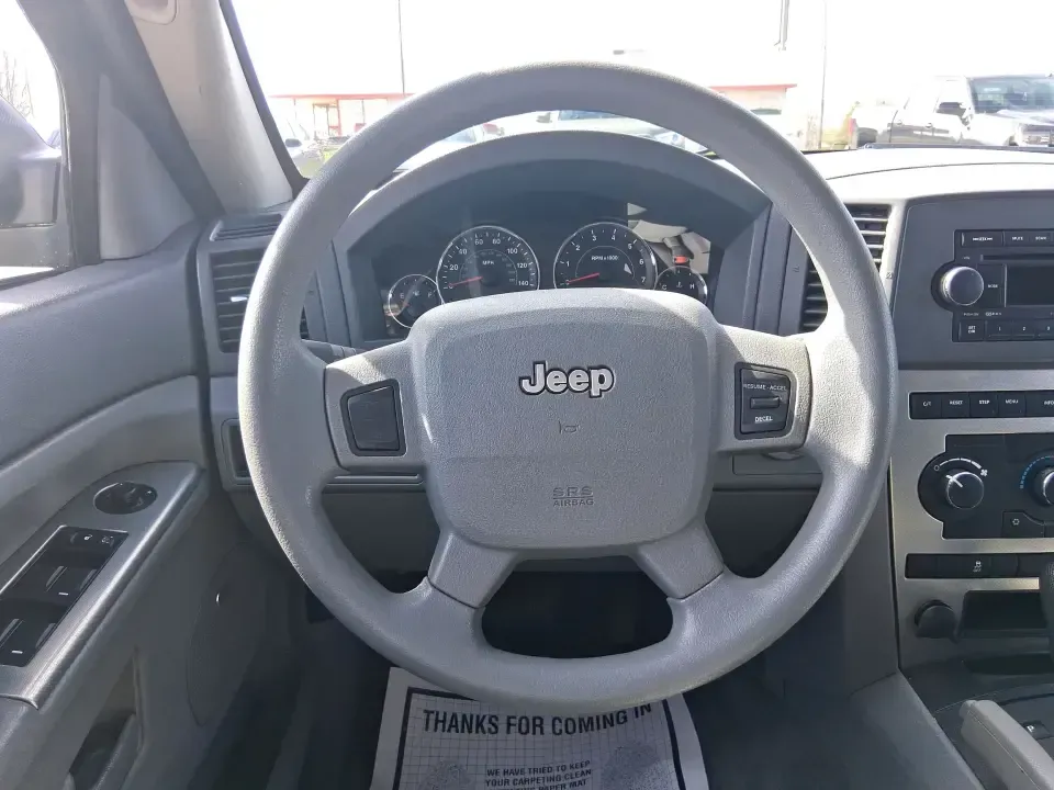 2007 Jeep Grand Cherokee Laredo (1J8GR48K47C) with an 3.7L V6 SOHC 12V engine, 5-Speed Automatic Overdrive transmission, located at 880 E. National Road, Vandalia, OH, 45377, (937) 908-9800, 39.891918, -84.183594 - Weekend getaways to the trails, winter commutes on slick Ohio roads, and family errands across town all get easier when you're in a capable SUV with true 4WD confidence. This **2007 Jeep Grand Cherokee Laredo** is built for drivers who want classic Jeep utility without giving up everyday comfort-ide - Photo#16