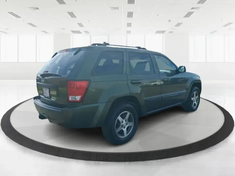 2007 Jeep Grand Cherokee Laredo (1J8GR48K47C) with an 3.7L V6 SOHC 12V engine, 5-Speed Automatic Overdrive transmission, located at 1951 S Dayton Lakeview Rd., New Carlisle, OH, 45344, (937) 908-9800, 39.890999, -84.050255 - Weekend getaways to the trails, winter commutes on slick Ohio roads, and family errands across town all get easier when you're in a capable SUV with true 4WD confidence. This **2007 Jeep Grand Cherokee Laredo** is built for drivers who want classic Jeep utility without giving up everyday comfort-ide - Photo#2