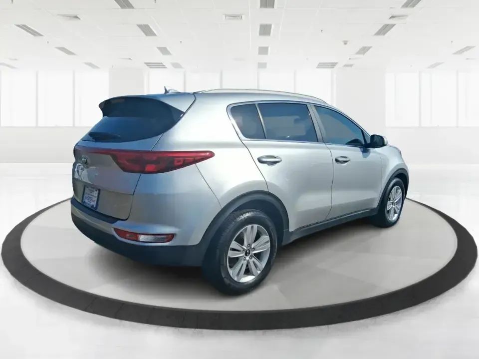 2017 Kia Sportage LX (KNDPM3AC7H7) with an Theta II 2.4L I-4 gasoline direct injection engine, 6A transmission, located at 8750 N County Rd 25A, Piqua, OH, 45356, (937) 908-9800, 40.164391, -84.232513 - Pack up the kids, load the groceries, or point the hood toward a weekend escape-this 2017 Kia Sportage LX is the kind of crossover that fits real life in West Central Ohio. With a comfortable cabin, versatile cargo space, and confident everyday drivability, it's ideal for commuters heading down I75, - Photo#2