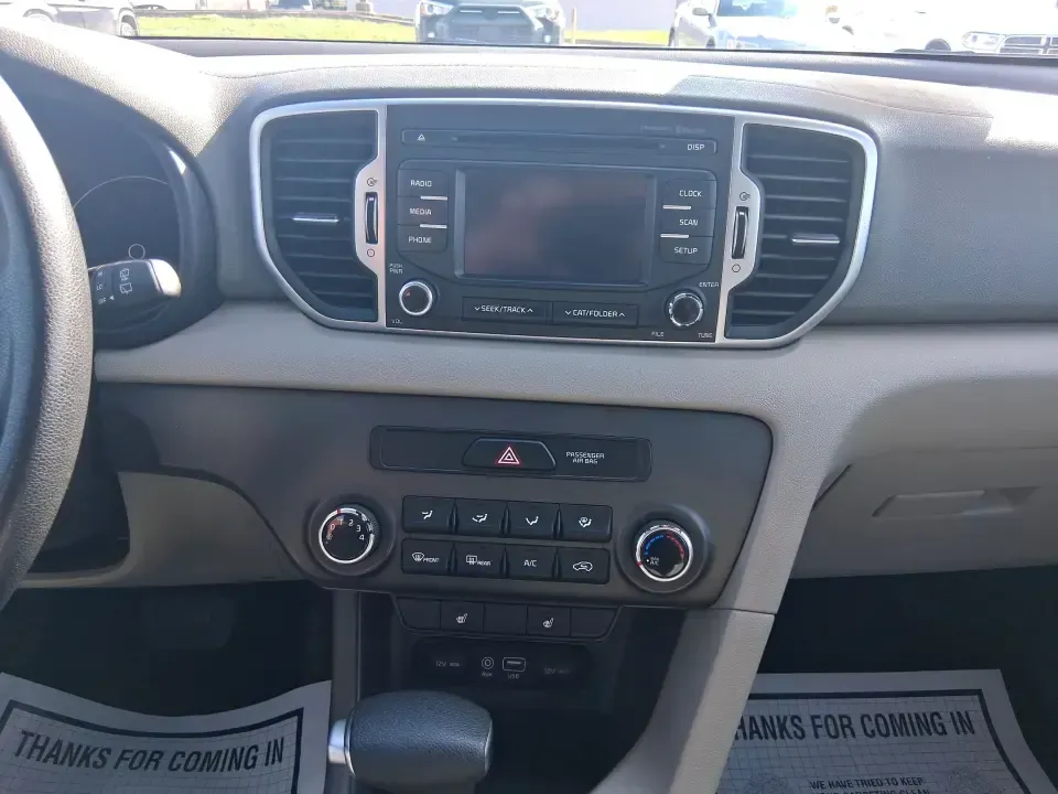 2017 Kia Sportage LX (KNDPM3AC7H7) with an Theta II 2.4L I-4 gasoline direct injection engine, 6A transmission, located at 8750 N County Rd 25A, Piqua, OH, 45356, (937) 908-9800, 40.164391, -84.232513 - Pack up the kids, load the groceries, or point the hood toward a weekend escape-this 2017 Kia Sportage LX is the kind of crossover that fits real life in West Central Ohio. With a comfortable cabin, versatile cargo space, and confident everyday drivability, it's ideal for commuters heading down I75, - Photo#13