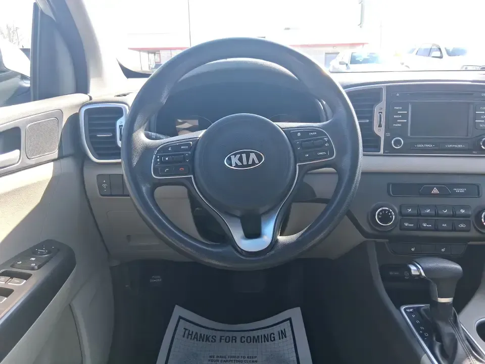 2017 Kia Sportage LX FWD (KNDPM3AC7H7) with an 2.4L V6 DOHC 24V engine, 6A transmission, located at 4508 South Dixie Dr, Moraine, OH, 45439, (937) 908-9800, 39.689976, -84.218452 - Need one vehicle that fits real life in Moraine-school drop-offs, the daily commute up and down South Dixie Dr, and spontaneous weekend runs to Carillon Historical Park or Riverscape MetroPark? This **2017 Kia Sportage LX FWD** is a practical crossover built for busy schedules and budget-conscious b- Photo#16