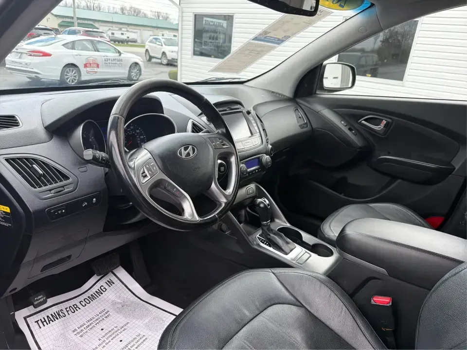 2015 Hyundai Tucson Limited (KM8JU3AG5FU) with an Theta II 2.4L I-4 gasoline direct injection engine, 6-Speed Automatic transmission, located at 8750 N County Rd 25A, Piqua, OH, 45356, (937) 908-9800, 40.164391, -84.232513 - Need a dependable SUV that fits real life-school drop-offs, long commutes up I75, and weekend getaways to Indian Lake or a quick lap around downtown Piqua? This 2015 Hyundai Tucson Limited is built for the everyday hustle with the comfort and tech that make each mile easier, whether you're running e - Photo#9