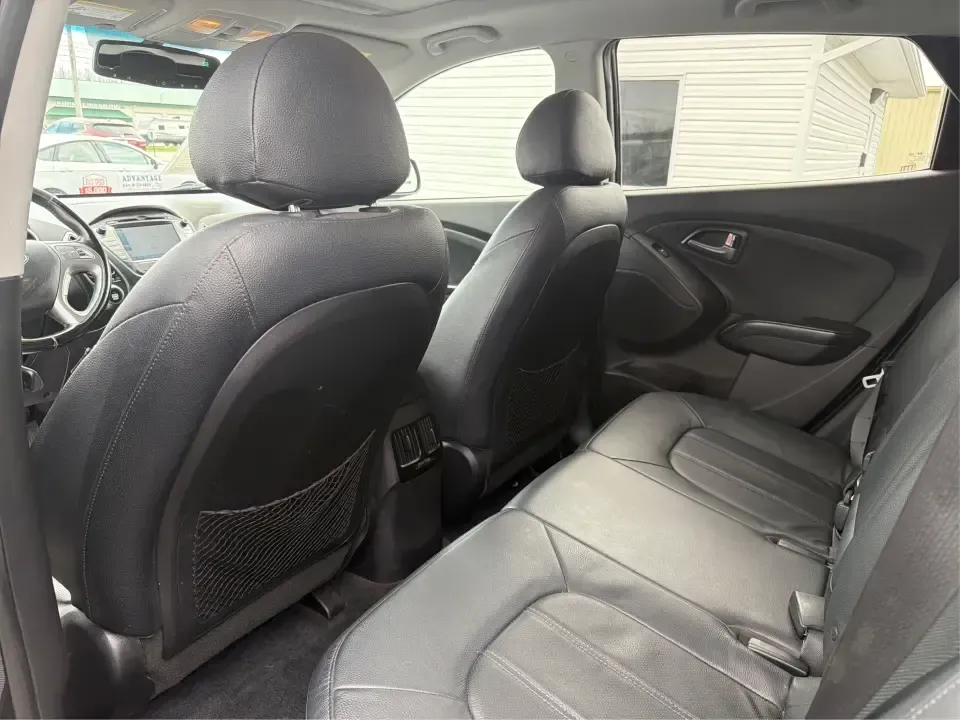 2015 Hyundai Tucson Limited (KM8JU3AG5FU) with an Theta II 2.4L I-4 gasoline direct injection engine, 6-Speed Automatic transmission, located at 8750 N County Rd 25A, Piqua, OH, 45356, (937) 908-9800, 40.164391, -84.232513 - Need a dependable SUV that fits real life-school drop-offs, long commutes up I75, and weekend getaways to Indian Lake or a quick lap around downtown Piqua? This 2015 Hyundai Tucson Limited is built for the everyday hustle with the comfort and tech that make each mile easier, whether you're running e - Photo#10