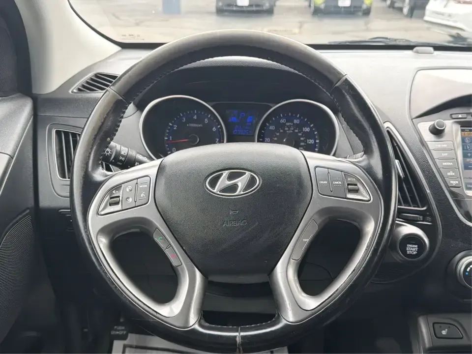 2015 Hyundai Tucson Limited (KM8JU3AG5FU) with an Theta II 2.4L I-4 gasoline direct injection engine, 6-Speed Automatic transmission, located at 8750 N County Rd 25A, Piqua, OH, 45356, (937) 908-9800, 40.164391, -84.232513 - Need a dependable SUV that fits real life-school drop-offs, long commutes up I75, and weekend getaways to Indian Lake or a quick lap around downtown Piqua? This 2015 Hyundai Tucson Limited is built for the everyday hustle with the comfort and tech that make each mile easier, whether you're running e - Photo#16