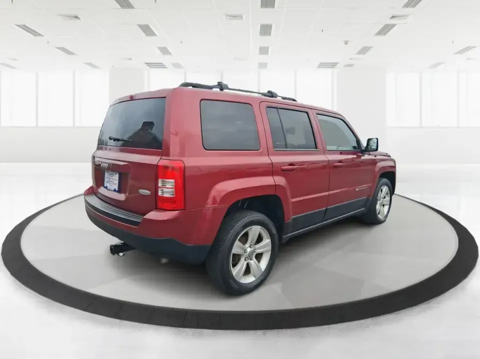 2014 Jeep Patriot Latitude (1C4NJPFB3ED) with an 2.4L L4 DOHC 16V engine, located at 8750 N County Rd 25A, Piqua, OH, 45356, (937) 908-9800, 40.164391, -84.232513 - Pack up the snacks, cue the playlist, and point the hood toward your next weekend escape-this 2014 Jeep Patriot Latitude is the kind of practical SUV that fits real life in West Central Ohio, whether you're commuting daily, shuttling kids to practice, or chasing fall colors on a backroad drive. Fini - Photo#2
