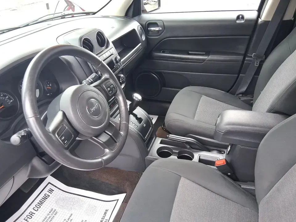 2014 Jeep Patriot Latitude (1C4NJPFB3ED) with an 2.4L L4 DOHC 16V engine, located at 8750 N County Rd 25A, Piqua, OH, 45356, (937) 908-9800, 40.164391, -84.232513 - Pack up the snacks, cue the playlist, and point the hood toward your next weekend escape-this 2014 Jeep Patriot Latitude is the kind of practical SUV that fits real life in West Central Ohio, whether you're commuting daily, shuttling kids to practice, or chasing fall colors on a backroad drive. Fini - Photo#9