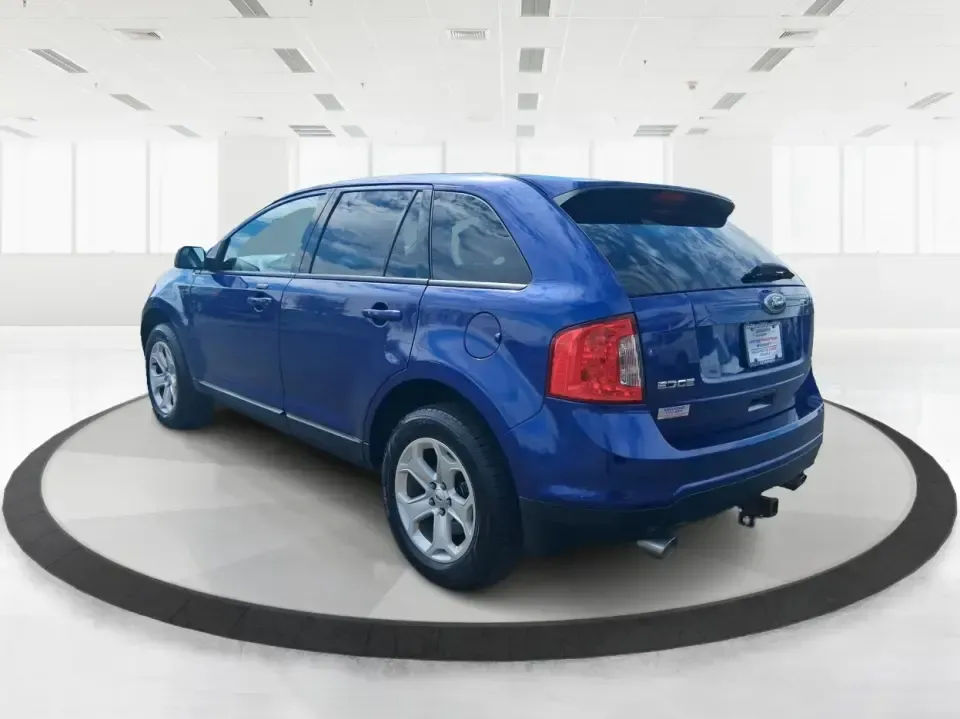 2013 Ford Edge SEL (2FMDK4JC3DB) with an 3.5L V-6 DOHC engine, 6-Speed Automatic transmission, located at 1099 N County Rd 25A , Troy, OH, 45373, (937) 908-9800, 40.057079, -84.212883 - Pack up the kids, cue up your favorite playlist, and point the nose toward a weekend getaway-this 2013 Ford Edge SEL is the kind of comfortable, confident SUV that fits real life in Troy, Ohio. Whether you're commuting up SR-25A, running after-school errands near downtown Troy, or loading up for a r - Photo#4