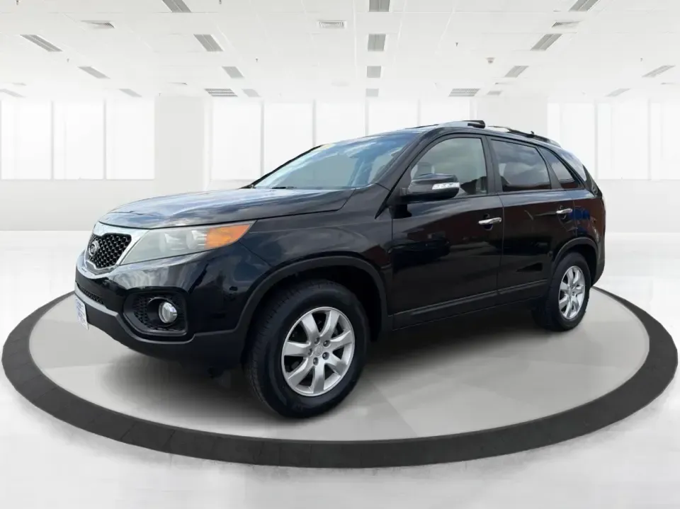 2012 Kia Sorento LX (5XYKT3A68CG) with an 2.4L I-4 gasoline direct injection engine, 6-Speed Automatic transmission, located at 1230 East Main St, Xenia, OH, 45385, (937) 908-9800, 39.688026, -83.910172 - Weekend getaways to John Bryan State Park, daily school drop-offs around Xenia, or an easy commute toward Beavercreek and Dayton-this Ebony Black 2012 Kia Sorento LX is the kind of SUV that fits real life. With practical space, confident road manners, and comfort features you'll appreciate on longer - Photo#8