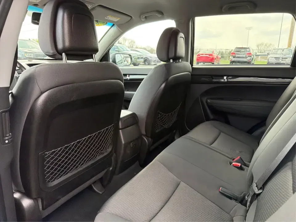 2012 Kia Sorento LX (5XYKT3A68CG) with an 2.4L I-4 gasoline direct injection engine, 6-Speed Automatic transmission, located at 1230 East Main St, Xenia, OH, 45385, (937) 908-9800, 39.688026, -83.910172 - Weekend getaways to John Bryan State Park, daily school drop-offs around Xenia, or an easy commute toward Beavercreek and Dayton-this Ebony Black 2012 Kia Sorento LX is the kind of SUV that fits real life. With practical space, confident road manners, and comfort features you'll appreciate on longer - Photo#10