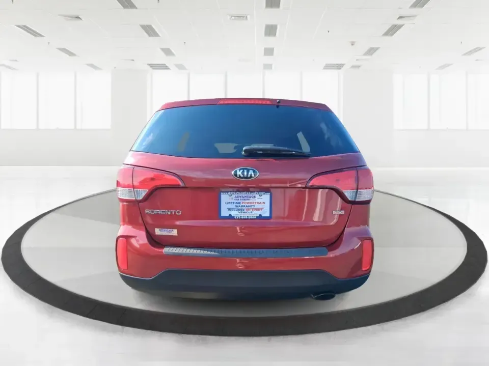 2014 Kia Sorento LX (5XYKTCA65EG) with an 2.4L I-4 gasoline direct injection engine, 6-Speed Automatic transmission, located at 1230 East Main St, Xenia, OH, 45385, (937) 908-9800, 39.688026, -83.910172 - Need one SUV that can handle Ohio winters, school drop-offs, and spontaneous weekend getaways to Indian Lake or a day trip to Dayton? This 2014 Kia Sorento LX in eye-catching Remington Red Metallic is a practical, confidence-building choice for busy families, commuters, and adventure-minded drivers - Photo#3