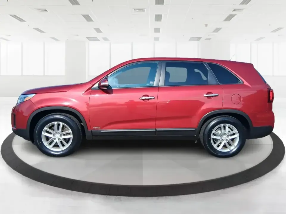2014 Kia Sorento LX (5XYKTCA65EG) with an 2.4L I-4 gasoline direct injection engine, 6-Speed Automatic transmission, located at 1230 East Main St, Xenia, OH, 45385, (937) 908-9800, 39.688026, -83.910172 - Need one SUV that can handle Ohio winters, school drop-offs, and spontaneous weekend getaways to Indian Lake or a day trip to Dayton? This 2014 Kia Sorento LX in eye-catching Remington Red Metallic is a practical, confidence-building choice for busy families, commuters, and adventure-minded drivers - Photo#5