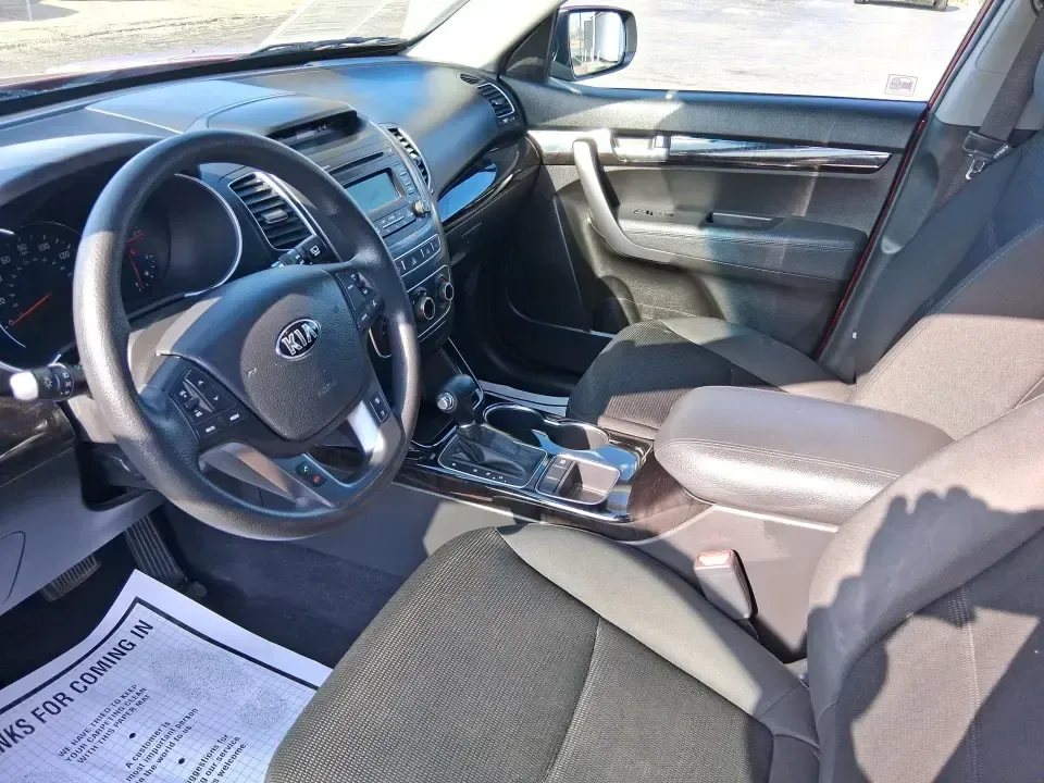 2014 Kia Sorento LX AWD (5XYKTCA65EG) with an 2.4L L4 DOHC 16V engine, 6-Speed Automatic transmission, located at 8750 N County Rd 25A, Piqua, OH, 45356, (937) 908-9800, 40.164391, -84.232513 - Need an SUV that can handle Ohio's changing seasons, school drop-offs, and weekend getaways without feeling like a chore? This **2014 Kia Sorento LX AWD** is built for real-life driving in and around **Piqua, OH**-from rainy commutes on **US-36** to snowy mornings near **I-75**, and family trips out- Photo#9