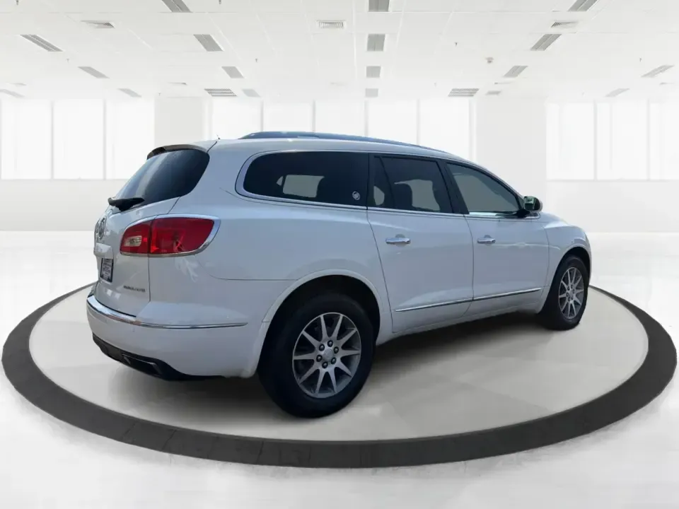 2015 Buick Enclave Leather (5GAKRBKDXFJ) with an 3.6L V-6 gasoline direct injection engine, 6-Speed Automatic Overdrive transmission, located at 1099 N County Rd 25A , Troy, OH, 45373, (937) 908-9800, 40.057079, -84.212883 - Pack up the kids, cue the road-trip playlist, and point your weekend plans toward somewhere fun-this 2015 Buick Enclave Leather in White Opal is built for real life in Troy, Ohio. Whether you're doing the school run, commuting up I75, or heading to the Dayton area for a family day out, the Enclave d - Photo#2