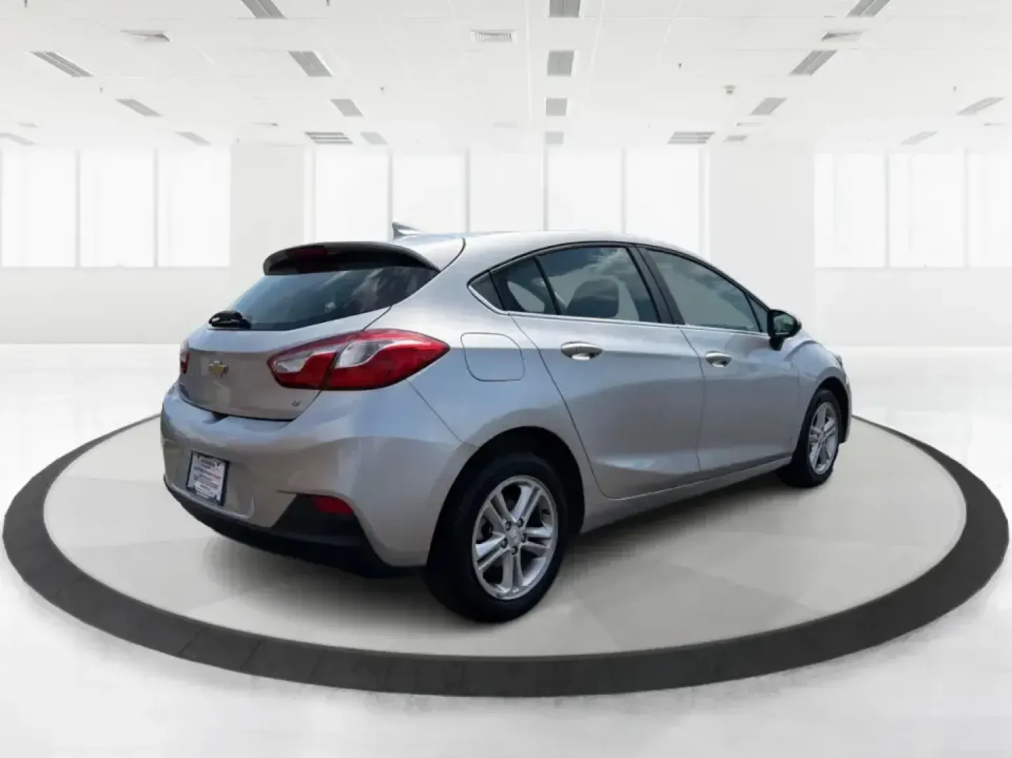 2018 Chevrolet Cruze LT Auto Hatchback (3G1BE6SM8JS) with an 1.4L L4 DOHC 16V TURBO engine, 6A transmission, located at 1230 East Main St, Xenia, OH, 45385, (937) 908-9800, 39.688026, -83.910172 - Picture your next week going smoother: a fuel-sipping hatchback for the daily commute up I75, roomy enough for grocery runs after practice, and nimble for squeezing into tight spots near the Dayton area. This 2018 Chevrolet Cruze LT Auto Hatchback in Silver Ice Metallic is a smart pick for drivers w- Photo#2