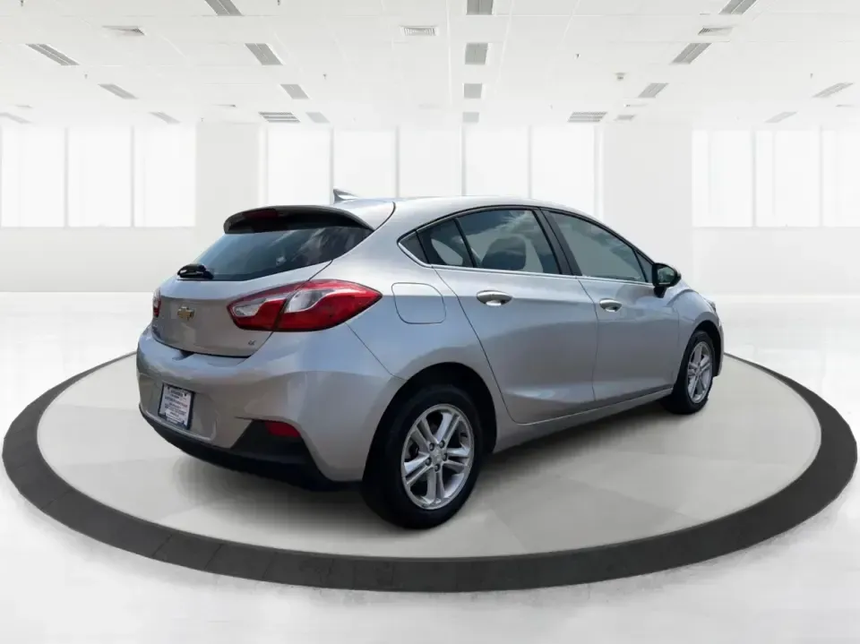 2018 Chevrolet Cruze LT Auto (3G1BE6SM8JS) with an 1.4L I-4 gasoline direct injection engine, 6A transmission, located at 880 E. National Road, Vandalia, OH, 45377, (937) 908-9800, 39.891918, -84.183594 - Pack the car, cue up your favorite playlist, and head out for a weekend getaway-this 2018 Chevrolet Cruze LT Auto Hatchback is the kind of practical, fuel-sipping daily driver that also shines for road trips, errands, and campus or work commutes around Vandalia. With its easy-to-park hatchback versa - Photo#2