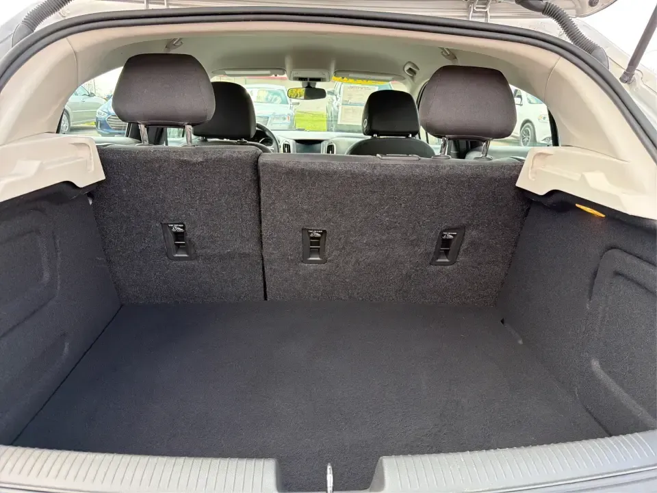 2018 Chevrolet Cruze LT Auto (3G1BE6SM8JS) with an 1.4L I-4 gasoline direct injection engine, 6A transmission, located at 880 E. National Road, Vandalia, OH, 45377, (937) 908-9800, 39.891918, -84.183594 - Pack the car, cue up your favorite playlist, and head out for a weekend getaway-this 2018 Chevrolet Cruze LT Auto Hatchback is the kind of practical, fuel-sipping daily driver that also shines for road trips, errands, and campus or work commutes around Vandalia. With its easy-to-park hatchback versa - Photo#12