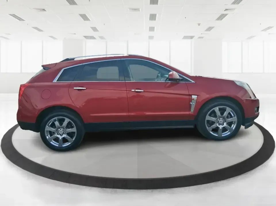 2011 Cadillac SRX Performance Collection (3GYFNEEY2BS) with an Ecotec 3L V-6 gasoline direct injection engine, 6-Speed Automatic transmission, located at 4508 South Dixie Dr, Moraine, OH, 45439, (937) 908-9800, 39.689976, -84.218452 - Picture your next road trip out of Moraine: the family loaded up, playlists ready, and plenty of space for sports gear, groceries, or weekend bags-without giving up comfort or style. This 2011 Cadillac SRX Performance Collection is the kind of SUV that fits real life in the Miami Valley: confident f - Photo#1