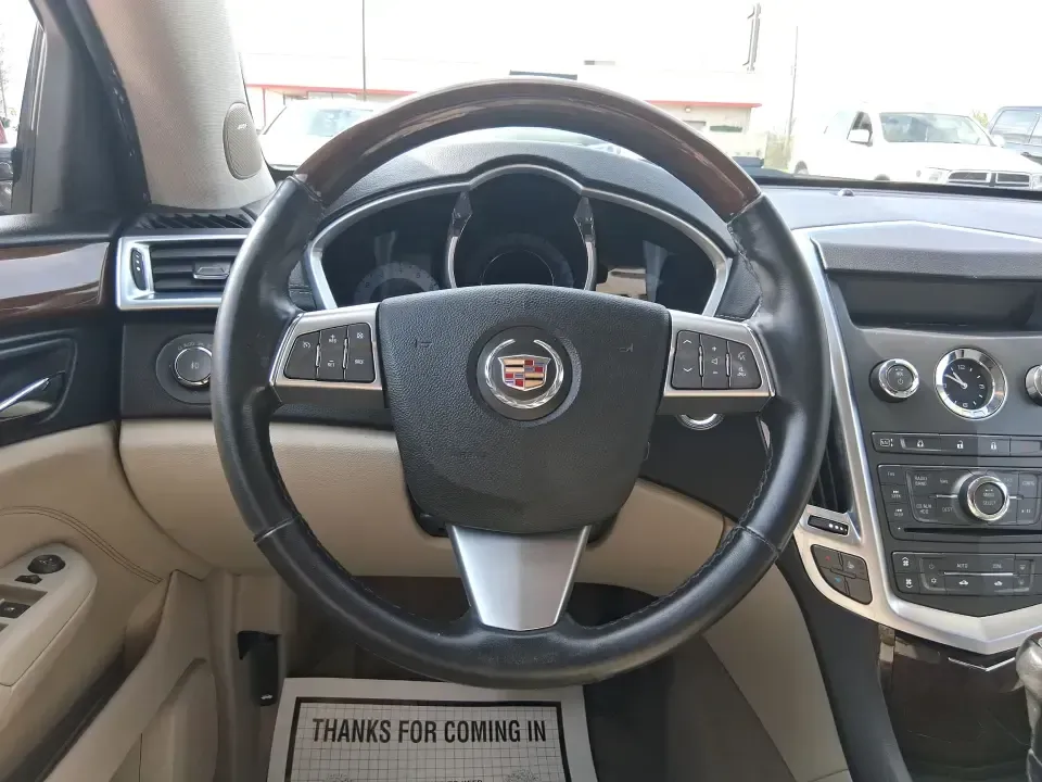 2011 Cadillac SRX Performance Collection (3GYFNEEY2BS) with an Ecotec 3L V-6 gasoline direct injection engine, 6-Speed Automatic transmission, located at 4508 South Dixie Dr, Moraine, OH, 45439, (937) 908-9800, 39.689976, -84.218452 - Picture your next road trip out of Moraine: the family loaded up, playlists ready, and plenty of space for sports gear, groceries, or weekend bags-without giving up comfort or style. This 2011 Cadillac SRX Performance Collection is the kind of SUV that fits real life in the Miami Valley: confident f - Photo#16