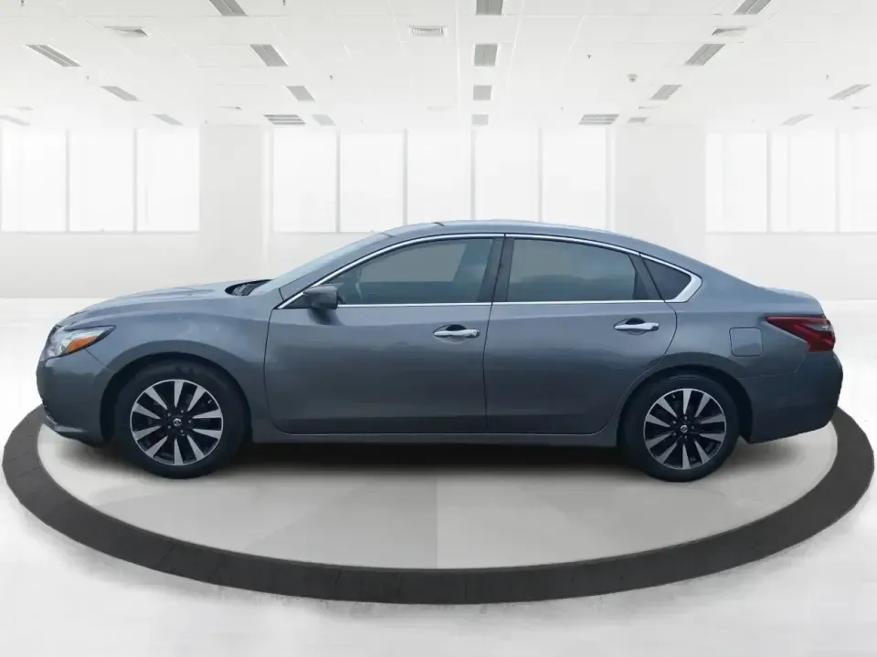 2018 Nissan Altima 2.5 SV (1N4AL3AP0JC) with an 2.5L I-4 DOHC engine, CVT transmission, located at 8750 N County Rd 25A, Piqua, OH, 45356, (937) 908-9800, 40.164391, -84.232513 - Make every mile easier-whether you're tackling a long commute down I75, running kids to practice after school, or planning a weekend day trip to the Miami County Fairgrounds. This 2018 Nissan Altima 2.5 SV in Gun Metallic is the kind of comfortable, efficient sedan that fits real-life schedules in P - Photo#5