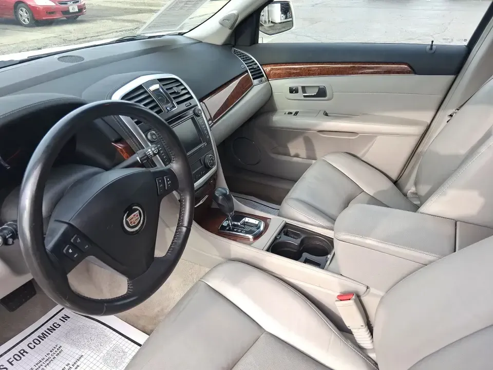 2007 Cadillac SRX V6 (1GYEE637370) with an 3.6L V-6 DOHC engine, 5-Speed Automatic Overdrive transmission, located at 8750 N County Rd 25A, Piqua, OH, 45356, (937) 908-9800, 40.164391, -84.232513 - Make your daily commute up I75 feel first-class, turn school drop-offs into a comfortable routine, and still have an SUV ready for weekend runs to Indian Lake or a quick getaway to downtown Troy. This 2007 Cadillac SRX V6 delivers the kind of upscale ride and practical versatility that fits real lif - Photo#9