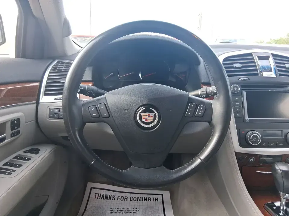 2007 Cadillac SRX V6 (1GYEE637370) with an 3.6L V-6 DOHC engine, 5-Speed Automatic Overdrive transmission, located at 8750 N County Rd 25A, Piqua, OH, 45356, (937) 908-9800, 40.164391, -84.232513 - Make your daily commute up I75 feel first-class, turn school drop-offs into a comfortable routine, and still have an SUV ready for weekend runs to Indian Lake or a quick getaway to downtown Troy. This 2007 Cadillac SRX V6 delivers the kind of upscale ride and practical versatility that fits real lif - Photo#16