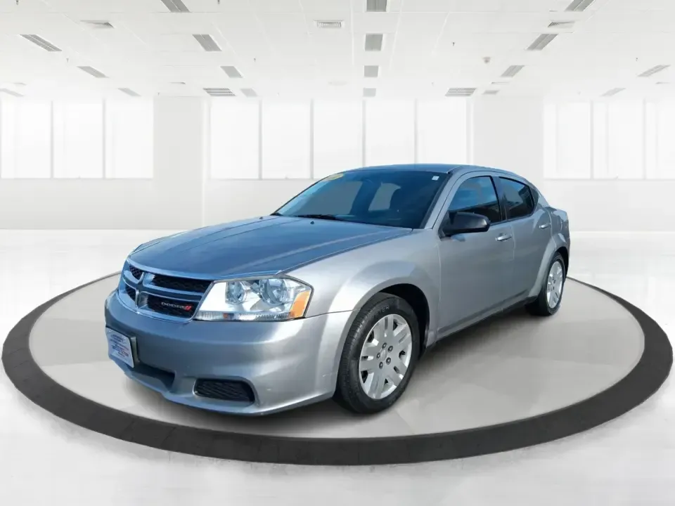 2014 Dodge Avenger SE (1C3CDZAB8EN) with an 2.4L L4 DOHC 16V engine, 4-Speed Automatic transmission, located at 1099 N County Rd 25A , Troy, OH, 45373, (937) 908-9800, 40.057079, -84.212883 - Picture an easy, stress-free daily commute from Moraine to downtown Dayton, with enough comfort for the school run, errands along South Dixie Drive, and the occasional weekend escape to Carillon Historical Park or a movie night near the Dayton Mall. If you want a practical sedan that fits real life- - Photo#8