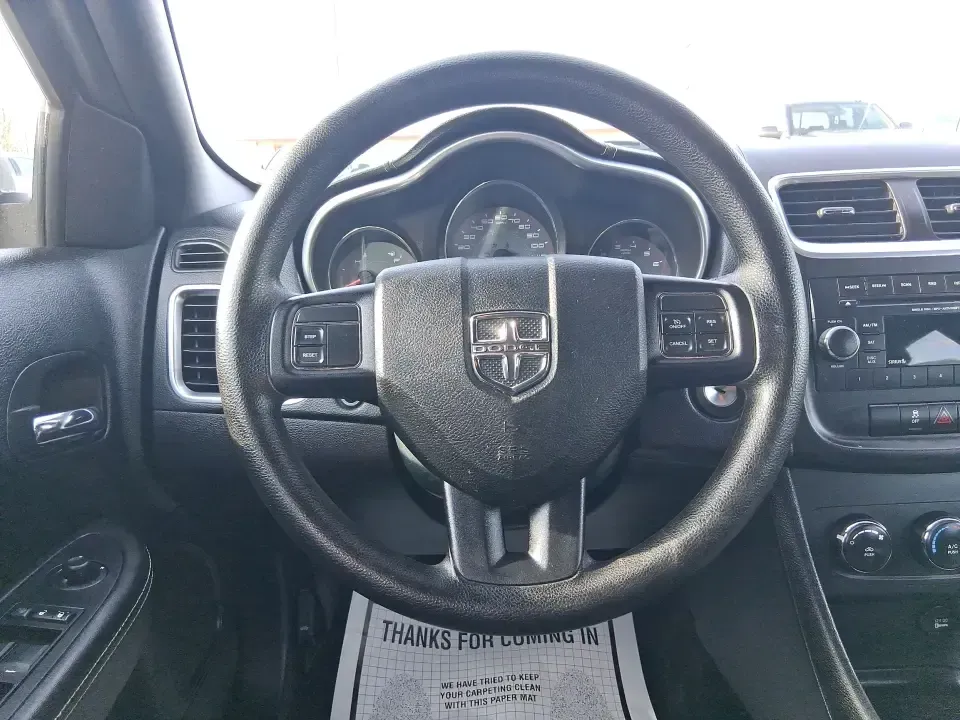 2014 Dodge Avenger SE (1C3CDZAB8EN) with an 2.4L L4 DOHC 16V engine, 4-Speed Automatic transmission, located at 1099 N County Rd 25A , Troy, OH, 45373, (937) 908-9800, 40.057079, -84.212883 - Picture an easy, stress-free daily commute from Moraine to downtown Dayton, with enough comfort for the school run, errands along South Dixie Drive, and the occasional weekend escape to Carillon Historical Park or a movie night near the Dayton Mall. If you want a practical sedan that fits real life- - Photo#16