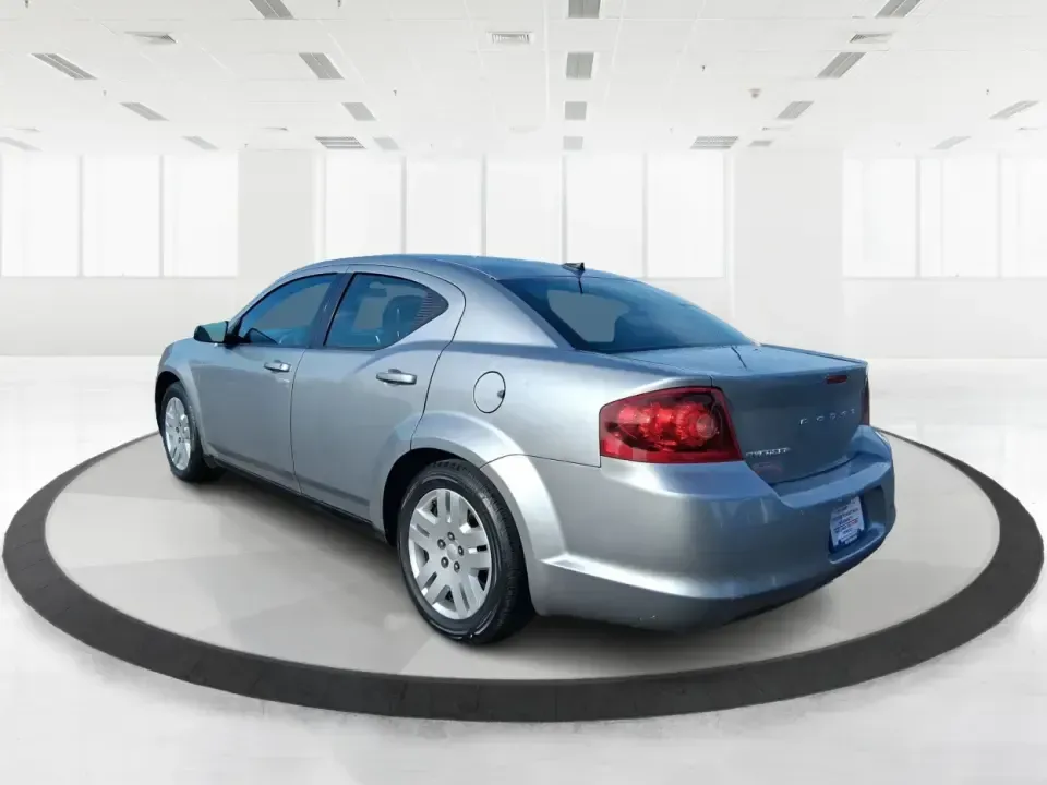 2014 Dodge Avenger SE (1C3CDZAB8EN) with an 2.4L L4 DOHC 16V engine, 4-Speed Automatic transmission, located at 1184 Kauffman Ave, Fairborn, OH, 45324, (937) 908-9800, 39.807072, -84.030914 - Picture an easy, stress-free daily commute from Moraine to downtown Dayton, with enough comfort for the school run, errands along South Dixie Drive, and the occasional weekend escape to Carillon Historical Park or a movie night near the Dayton Mall. If you want a practical sedan that fits real life- - Photo#4