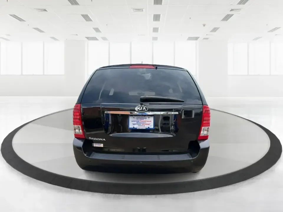 2012 Kia Sedona LX (KNDMG4C78C6) with an 3.5L V-6 DOHC engine, 5-Speed Automatic transmission, located at 401 Woodman Dr, Riverside, OH, 45431, (937) 908-9800, 39.760899, -84.123421 - Picture the next family road trip, soccer Saturday, or airport pickup where everyone actually fits comfortably-plus there's room left for groceries, strollers, and weekend gear. This 2012 Kia Sedona LX in Aurora Black is built for real life: school drop-offs, long commutes across the Miami Valley, a - Photo#3