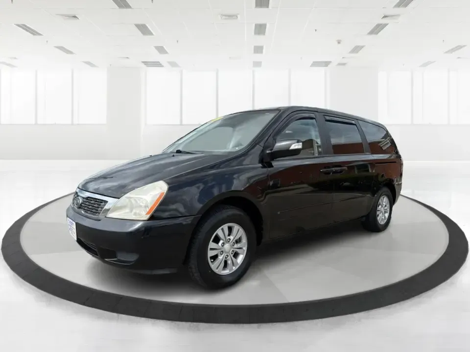 2012 Kia Sedona LX (KNDMG4C78C6) with an 3.5L V-6 DOHC engine, 5-Speed Automatic transmission, located at 401 Woodman Dr, Riverside, OH, 45431, (937) 908-9800, 39.760899, -84.123421 - Picture the next family road trip, soccer Saturday, or airport pickup where everyone actually fits comfortably-plus there's room left for groceries, strollers, and weekend gear. This 2012 Kia Sedona LX in Aurora Black is built for real life: school drop-offs, long commutes across the Miami Valley, a - Photo#8