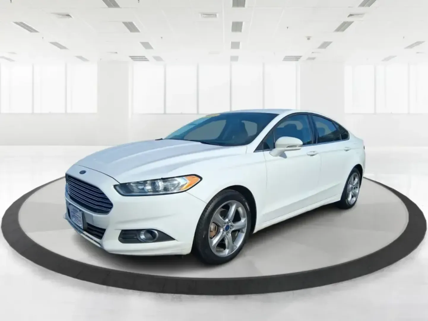 2016 Ford Fusion SE (3FA6P0H91GR) with an 2.0L L4 DOHC 16V engine, 6-Speed Automatic transmission, located at 880 E. National Road, Vandalia, OH, 45377, (937) 908-9800, 39.891918, -84.183594 - Need a dependable commuter that can handle I75 traffic, school drop-offs, and weekend runs to Dayton without draining your budget? This 2016 Ford Fusion SE in Oxford White is the kind of practical, comfortable sedan that fits real life in Vandalia-smooth for daily driving, efficient on regular unlea - Photo#8