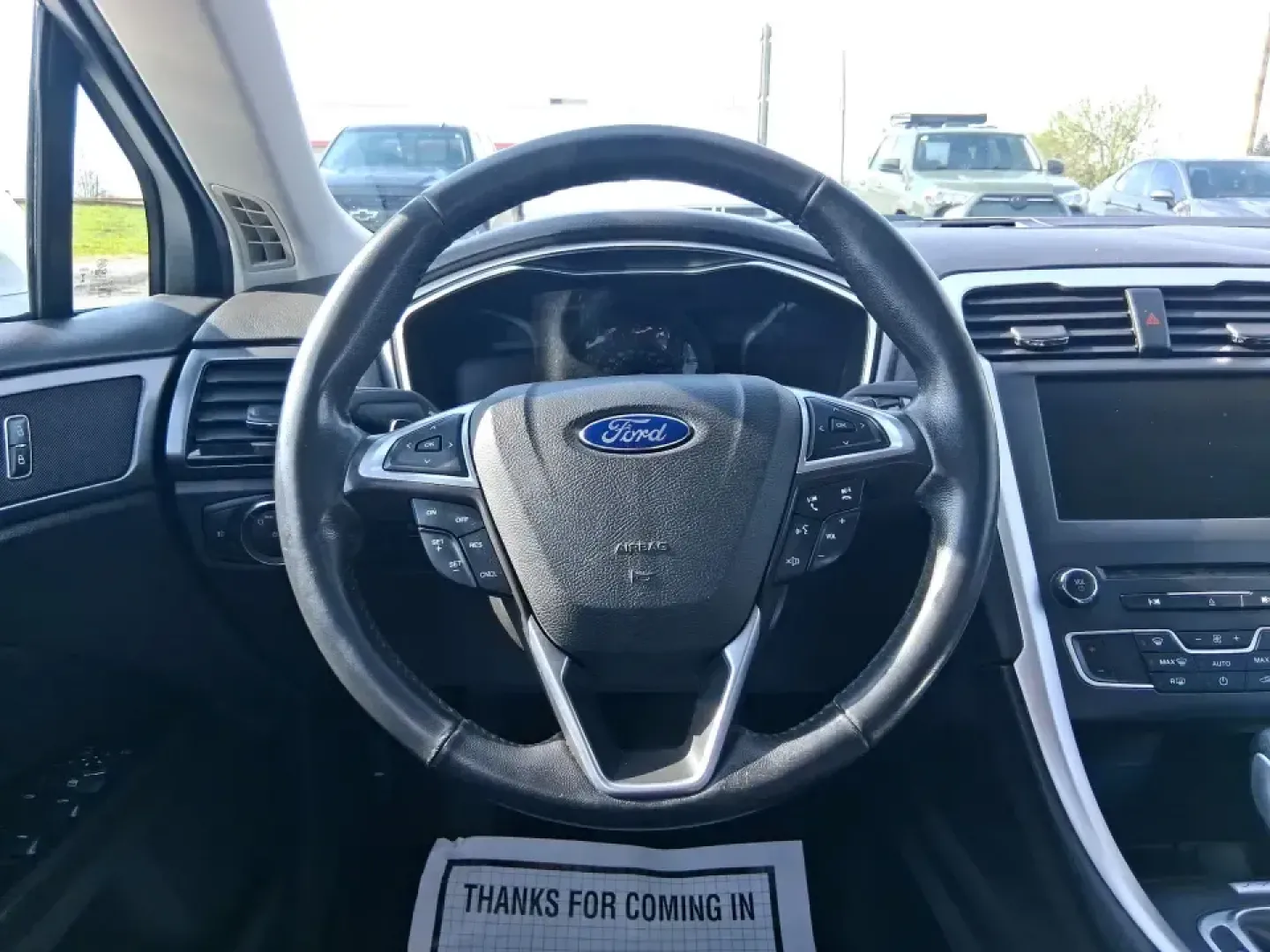 2016 Ford Fusion SE (3FA6P0H91GR) with an 2.0L L4 DOHC 16V engine, 6-Speed Automatic transmission, located at 880 E. National Road, Vandalia, OH, 45377, (937) 908-9800, 39.891918, -84.183594 - Need a dependable commuter that can handle I75 traffic, school drop-offs, and weekend runs to Dayton without draining your budget? This 2016 Ford Fusion SE in Oxford White is the kind of practical, comfortable sedan that fits real life in Vandalia-smooth for daily driving, efficient on regular unlea - Photo#16
