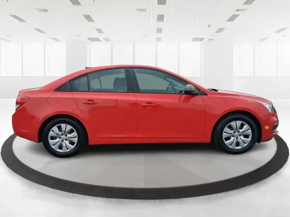 2015 Chevrolet Cruze LS Auto (1G1PA5SG9F7) with an ECOTEC 1.8L I-4 DOHC engine, 6-Speed Automatic transmission, located at 8750 N County Rd 25A, Piqua, OH, 45356, (937) 908-9800, 40.164391, -84.232513 - Picture an easy, affordable daily commute that still feels comfortable on I75, quick trips to downtown Piqua for dinner, and weekend errands that don't drain your budget at the pump. This 2015 Chevrolet Cruze LS Auto in eye-catching Red Hot is a smart, practical sedan for commuters, first-time buyer - Photo#1