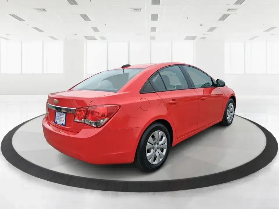 2015 Chevrolet Cruze LS Auto (1G1PA5SG9F7) with an ECOTEC 1.8L I-4 DOHC engine, 6-Speed Automatic transmission, located at 8750 N County Rd 25A, Piqua, OH, 45356, (937) 908-9800, 40.164391, -84.232513 - Picture an easy, affordable daily commute that still feels comfortable on I75, quick trips to downtown Piqua for dinner, and weekend errands that don't drain your budget at the pump. This 2015 Chevrolet Cruze LS Auto in eye-catching Red Hot is a smart, practical sedan for commuters, first-time buyer - Photo#2