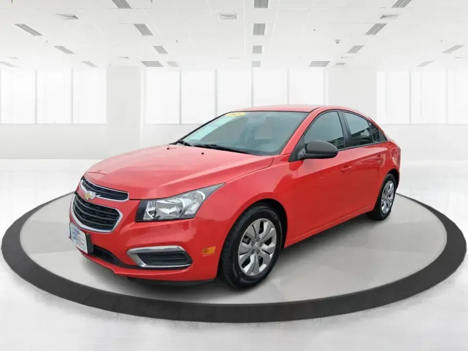 2015 Chevrolet Cruze LS Auto (1G1PA5SG9F7) with an ECOTEC 1.8L I-4 DOHC engine, 6-Speed Automatic transmission, located at 8750 N County Rd 25A, Piqua, OH, 45356, (937) 908-9800, 40.164391, -84.232513 - Picture an easy, affordable daily commute that still feels comfortable on I75, quick trips to downtown Piqua for dinner, and weekend errands that don't drain your budget at the pump. This 2015 Chevrolet Cruze LS Auto in eye-catching Red Hot is a smart, practical sedan for commuters, first-time buyer - Photo#8